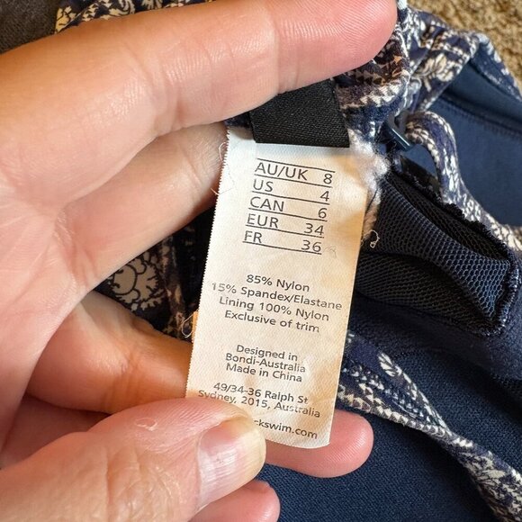 Niptuck Porcelain Joanne Twist Front Design Tummy Control One Piece Suit - Picture 6 of 6